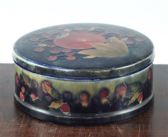 A William Moorcroft pomegranate circular box and cover, c.1920, 16cm